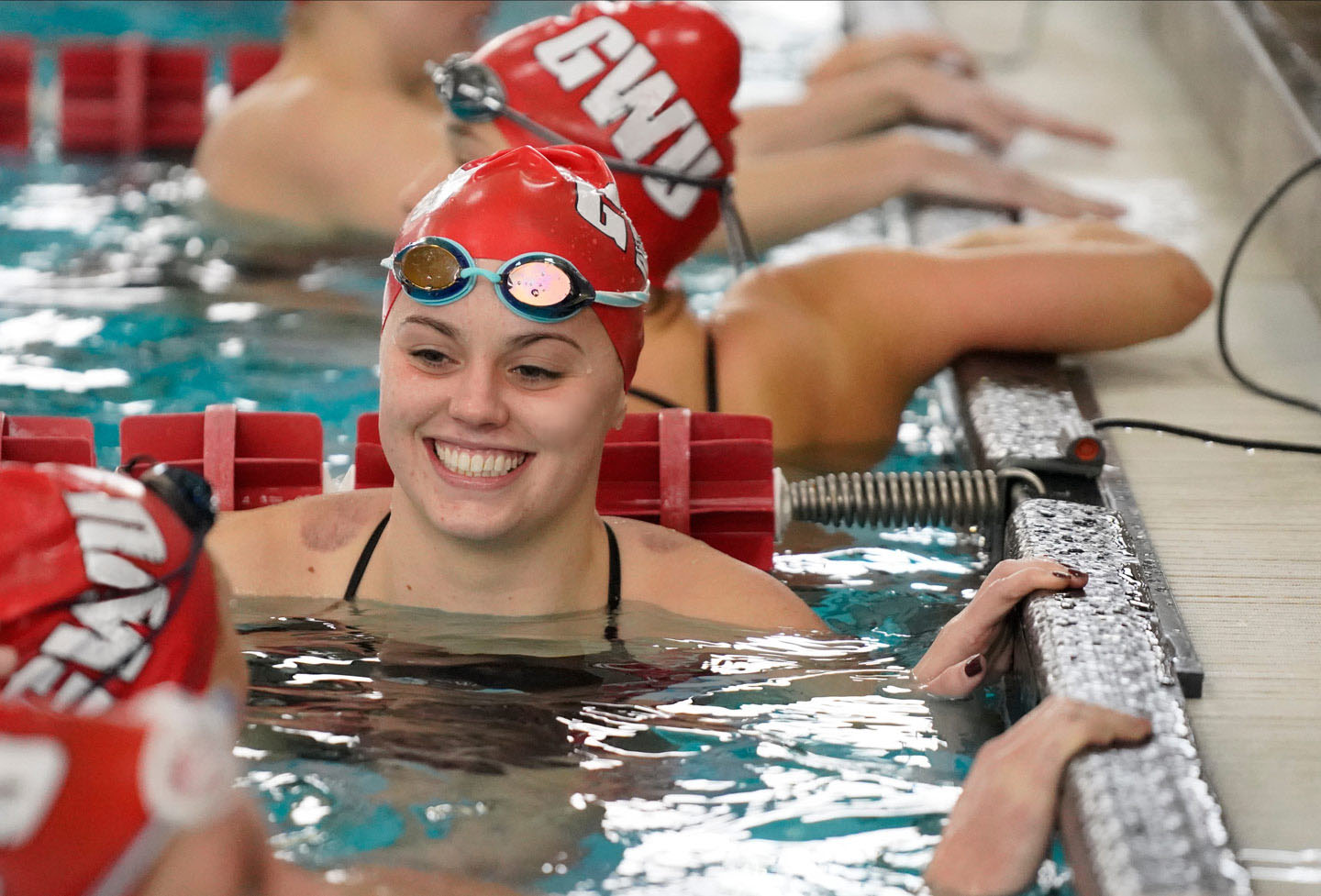 GWU Female Swimmer at competition